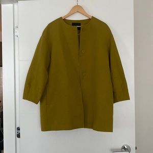 Like new Beautiful mid length green evening coat